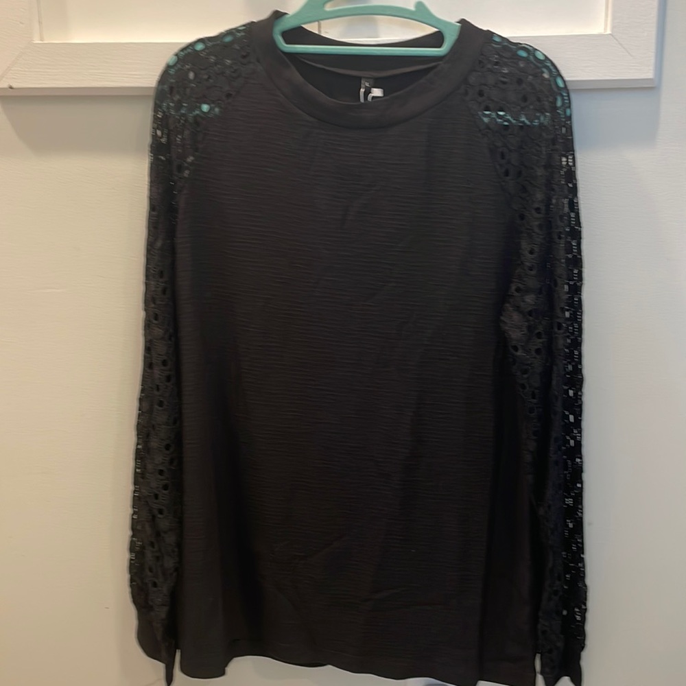 Women’s black blouse with lace sleeves